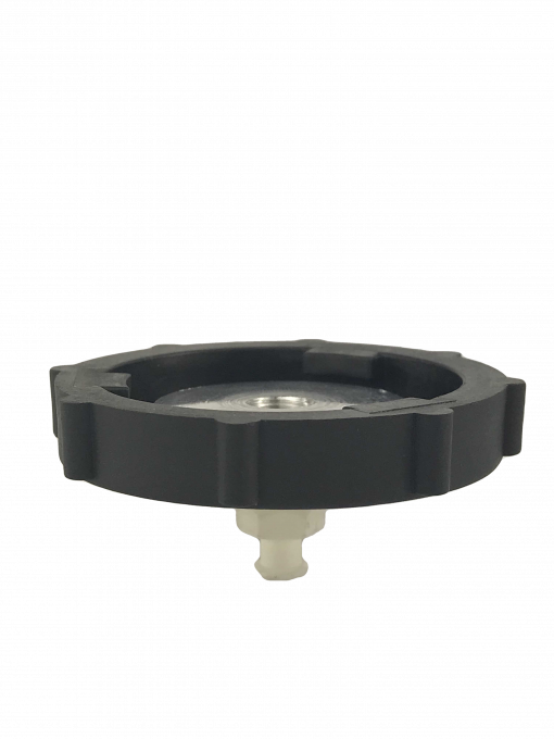 a BC-42 Master Cylinder Cap Adapter- GM 2013+ which is a black cap with a white top. It is a specialty tool used to convert a standard cap into a master cylinder cap on certain General Motors vehicles from 2013 onwards.