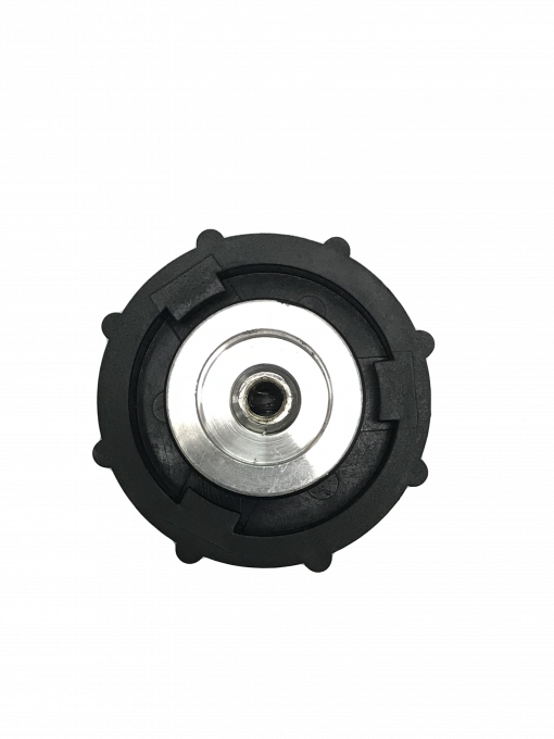 a close-up of a metal bearing. It is circular and silver in color, with a black inner race