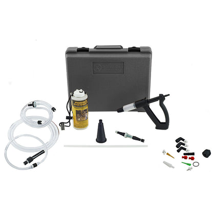 The image shows a plastic toolbox containing a syringe, hose and spray bottle. The text on the toolbox says “Phoenix Systems V-12 Reverse Brake & Clutch Bleeder Kit”.  A bleed kit is a tool used to remove air from a vehicle's hydraulic brake system.